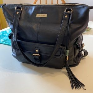 Black leather Lily Jade meggan bag/ diaper bag with removable insert and pad.